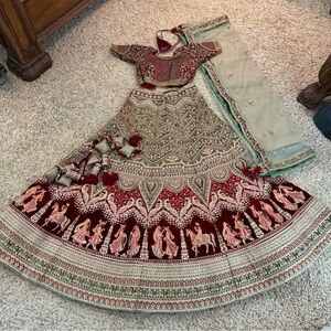 Brand new Elegant Red and Gold Embroidered Lehenga Set